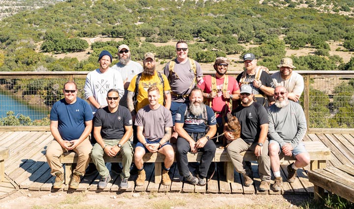 A group of wounded warriors gathered together for a picture while participating in Project Odyssey.